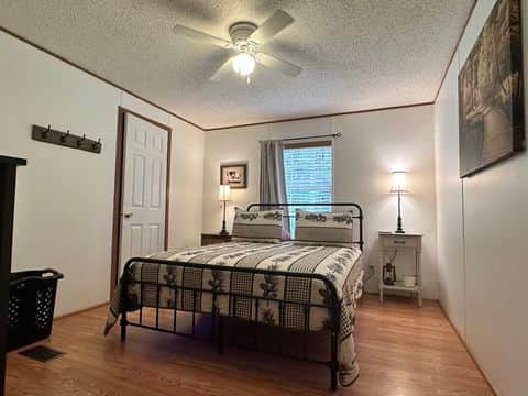Master bedroom king suite with private bath at ATV cabin retreat Delbarton WV